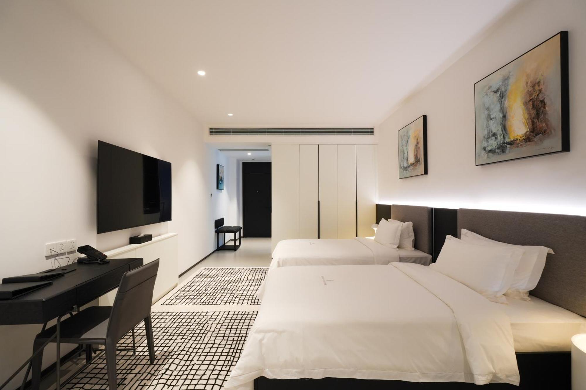 One Riviera Hotel And Residences Ban Souanmone Экстерьер фото