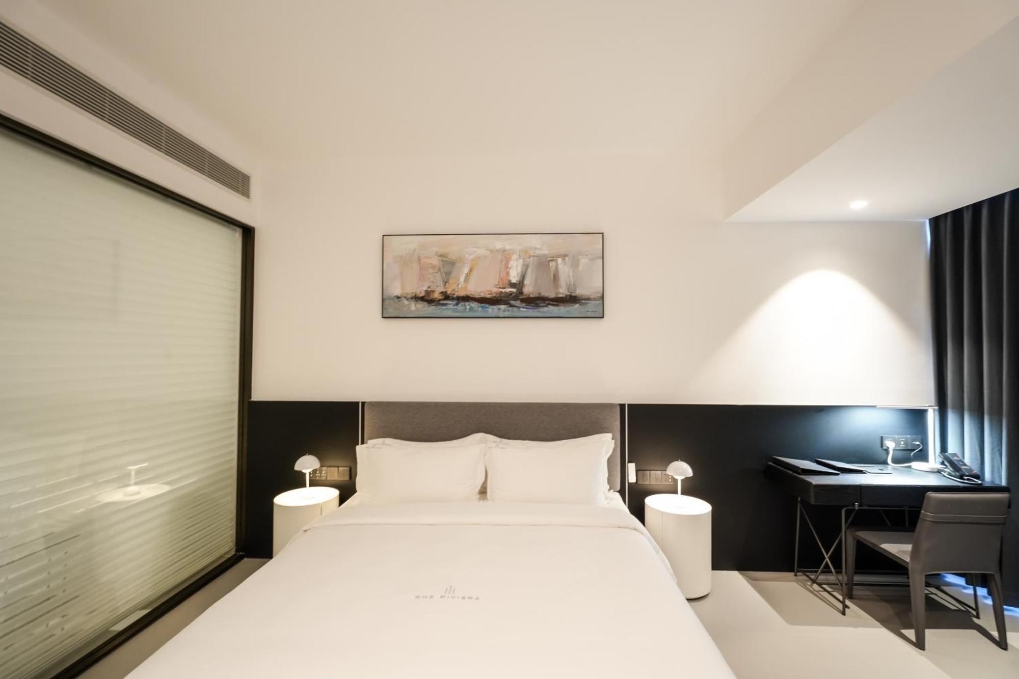 One Riviera Hotel And Residences Ban Souanmone Экстерьер фото