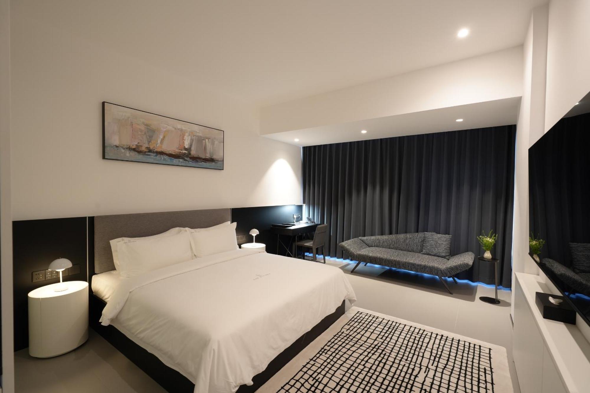 One Riviera Hotel And Residences Ban Souanmone Экстерьер фото